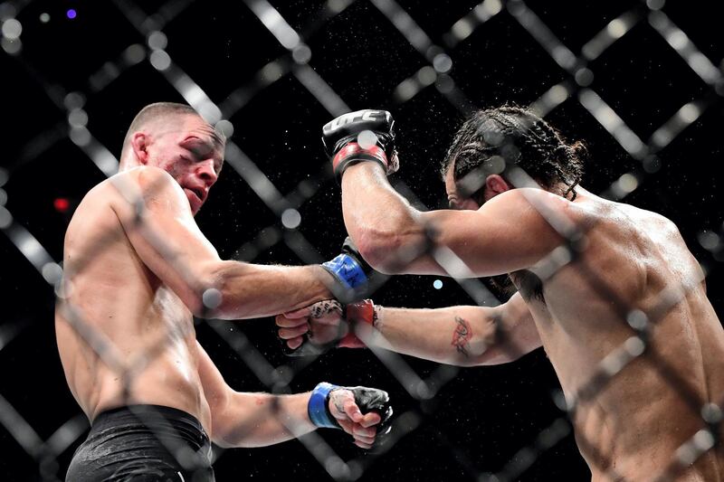 NEW YORK, NEW YORK - NOVEMBER 02: Nate Diaz of the United States (L) fights against Jorge Masvidal of the United States in the Welterweight "BMF" championship bout during UFC 244 at Madison Square Garden on November 02, 2019 in New York City. (Photo by Steven Ryan/Getty Images)