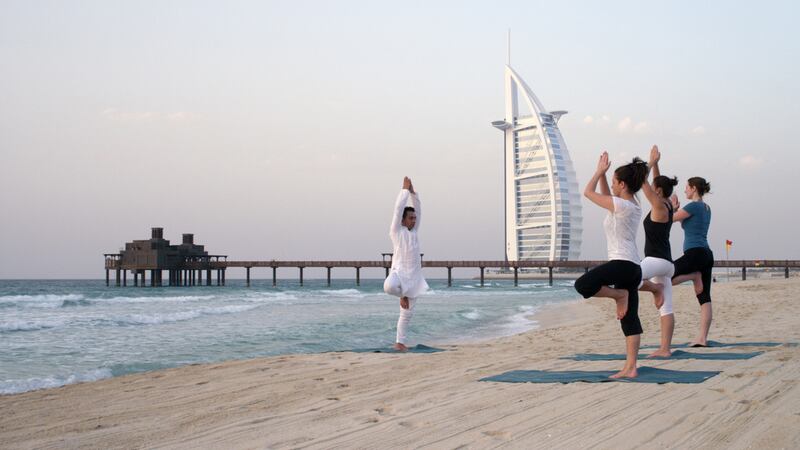 Enjoy daily sunset yoga on the beach at Madinat Jumeirah during the Talise Summer Yoga Weekend Retreat from May 11 to 13. Courtesy Talise Spa