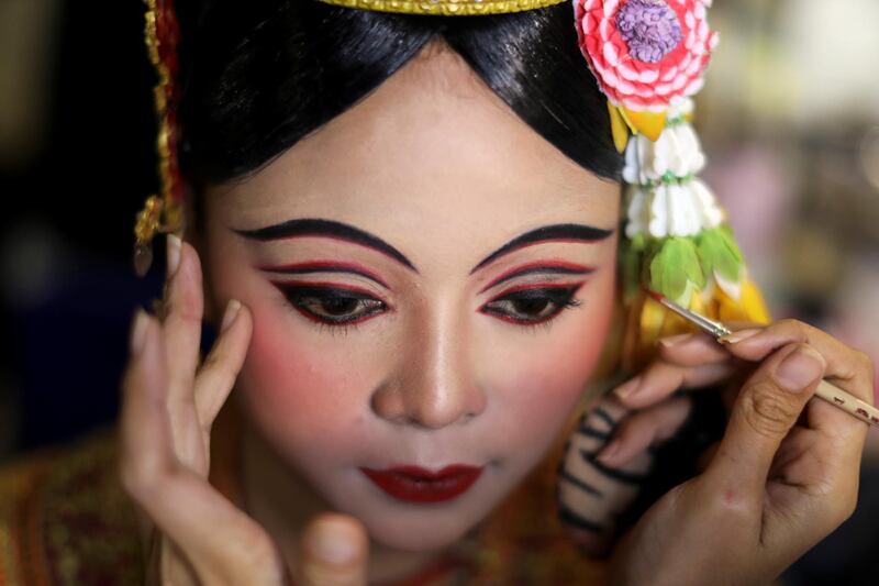 Dancers get ready backstage before a performance of masked theatre known as Khon which was recently listed by UNESCO, the United Nations' cultural agency, as an intangible cultural heritage, along with neighbouring Cambodia's version of the dance, known as Lakhon Khol at the Thailand Cultural Centre in Bangkok, Thailand. Reuters