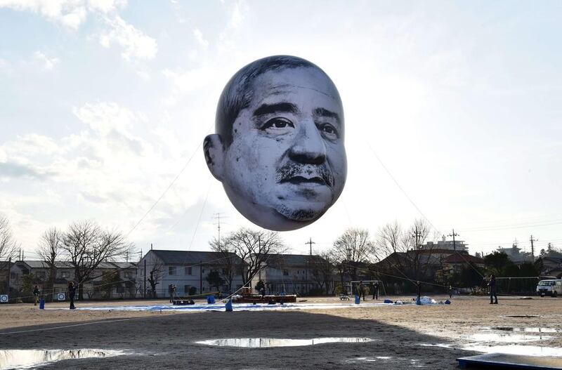 A large balloon of a face of “ojisan”, a middle-aged man, floats in the sky above the grounds of Nishiki elementary school in Utsunomiya in Tochigi prefecture, 100km north of Tokyo. Yoshikazu Tsuno / AFP