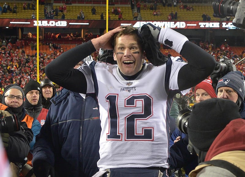 Jan 20, 2019; Kansas City, MO, USA; New England Patriots quarterback Tom Brady (12) reacts after defeating the Kansas City Chiefs during overtime in the AFC Championship game at Arrowhead Stadium. Mandatory Credit: Jay Biggerstaff-USA TODAY Sports