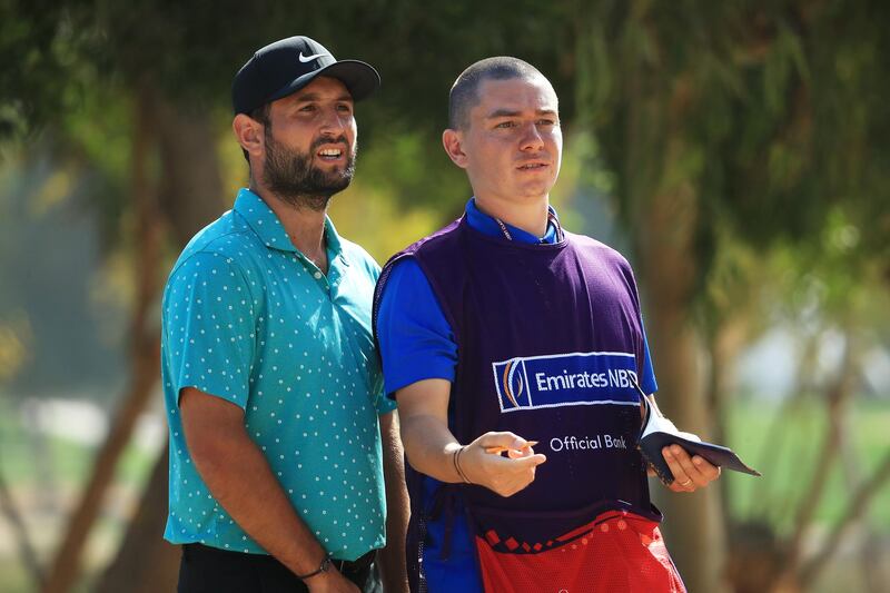 Alexander Levy of France and his caddie look on the 18th hole during Day Two of the Omega Dubai Desert Classic. Getty