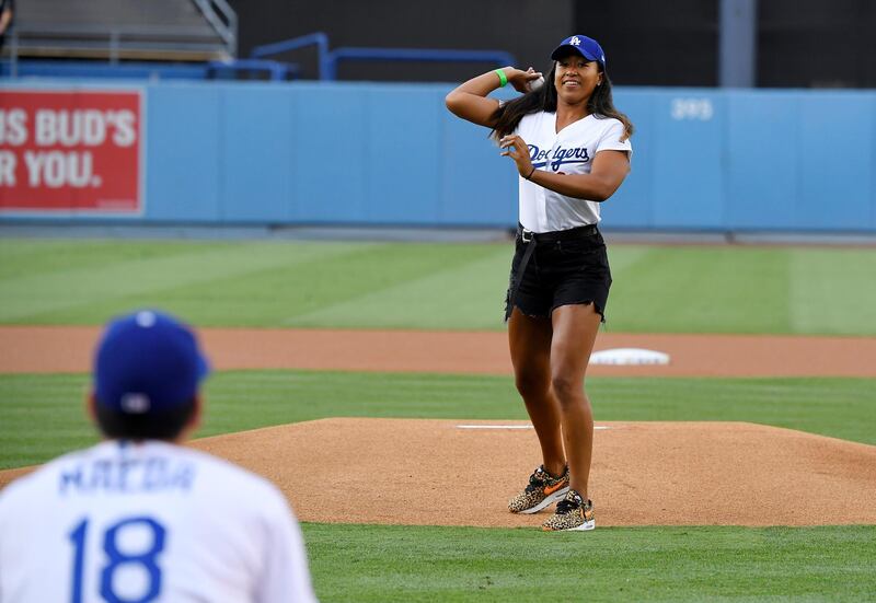 Osaka makes her pitch at Dodger Stadium. AP
