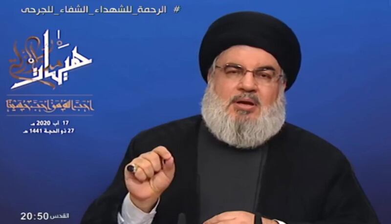 epa08609481 A handout grab picture from Hezbollah's al-Manar TV shows Hezbollah leader Sayyed Hassan Nasrallah giving a speech in Beirut, Lebanon, 14 August 2020. Sayyed Hassan Nasrallah spoke about Ashura and the establishment of mourning councils during the ten days of Ashura, which cannot be held as every year due to the outbreak of the Corona epidemic, and asked the party's audience not to gather and to set up Ashura mourning councils through social media, and not clashing with anyone and respecting the occasion, due to the frightening spread of the Coronavirus in Lebanon and the increase in the number of infected people.  EPA/AL-MANAR TV / HANDOUT  HANDOUT EDITORIAL USE ONLY/NO SALES