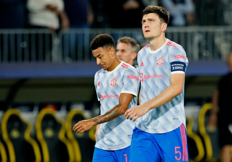 Soccer Football - Champions League - Group F - BSC Young Boys v Manchester United - Stadion Wankdorf, Bern, Switzerland - September 14, 2021 Manchester United's Jesse Lingard and Harry Maguire look dejected after the match REUTERS / Denis Balibouse