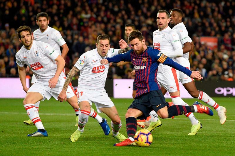 Barcelona forward Lionel Messi scores against Eibar in Barcelona's 3-0 win at Camp Nou. It was the Argentine's 400th La Liga goal for the club. Reuters