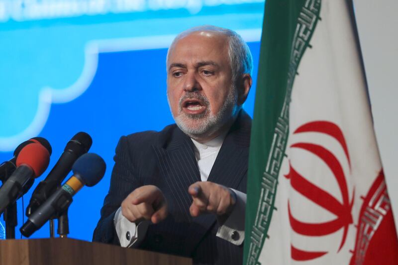FILE - In this Feb. 23, 2021 file photo, Iran's Foreign Minister Mohammad Javad Zarif addresses in a conference in Tehran, Iran. Iran's top diplomat expressed regret Wednesday, April 28, 2021, that a recording leaked out of him making frank comments about the limits of his power in the Islamic Republic, while the country's president describing the incident as a means to derail ongoing talks with world powers over Tehran's tattered nuclear deal. (AP Photo/Vahid Salemi, File)