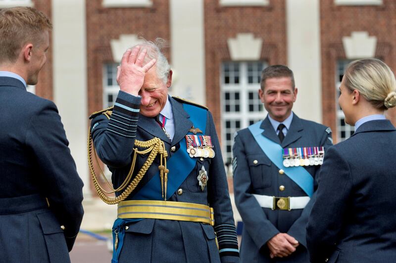 Britain's Prince Charles meets the graduates after the Graduation Ceremony of The Queen's Squadron and Sovereign's review at RAF College Cranwell, Britain. REUTERS