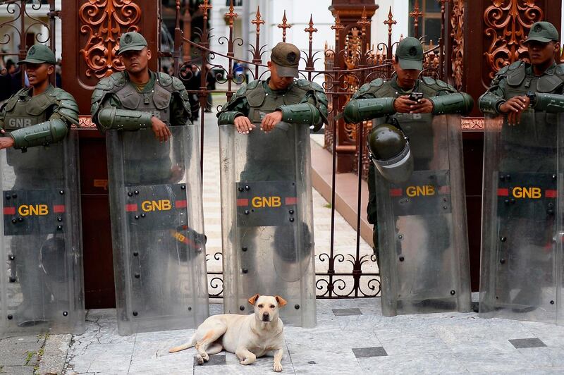 Members of the Venezuelan National Guard stand guard outside the National Assembly in Caracas. AFP