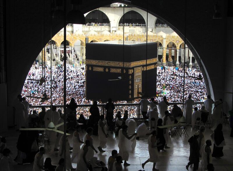 Muslim worshippers circumambulate around the Kaaba, the cubic building at the Grand Mosque, during the pilgrimage known as Umrah, marking Ramadan in Makkah, Saudi Arabia. AP Photo/Amr Nabil