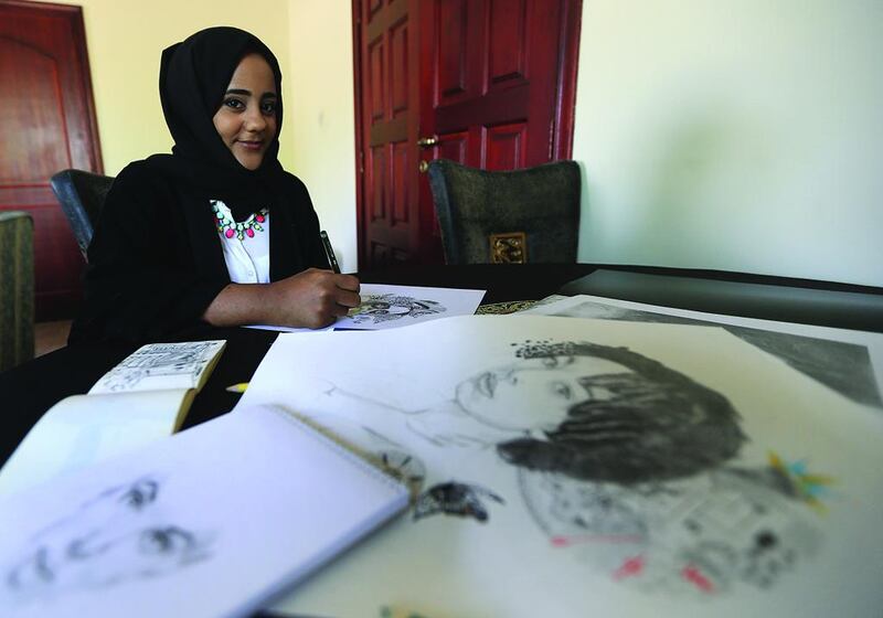 Fatima Farah pictured with some of her artwork at her home in Abu Dhabi. Ravindranath K / The National