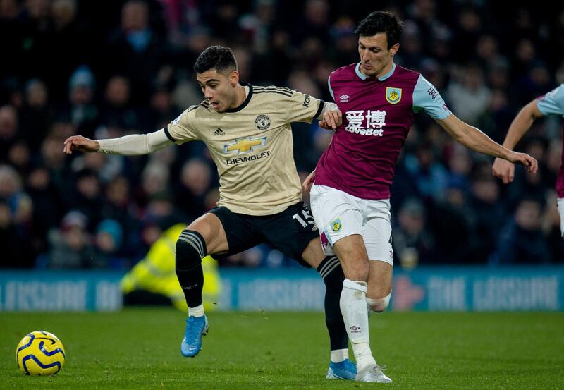 Andreas Pereira (L) in action with Burnley's Jack Cork. EPA