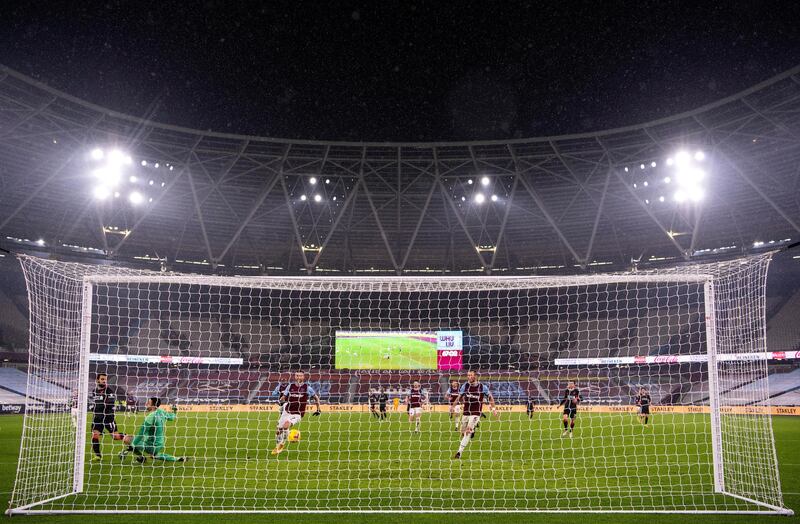 LONDON, ENGLAND - JANUARY 31: Mohamed Salah of Liverpool scores their side's second goal during the Premier League match between West Ham United and Liverpool at London Stadium on January 31, 2021 in London, England. Sporting stadiums around the UK remain under strict restrictions due to the Coronavirus Pandemic as Government social distancing laws prohibit fans inside venues resulting in games being played behind closed doors. (Photo by Justin Setterfield/Getty Images)