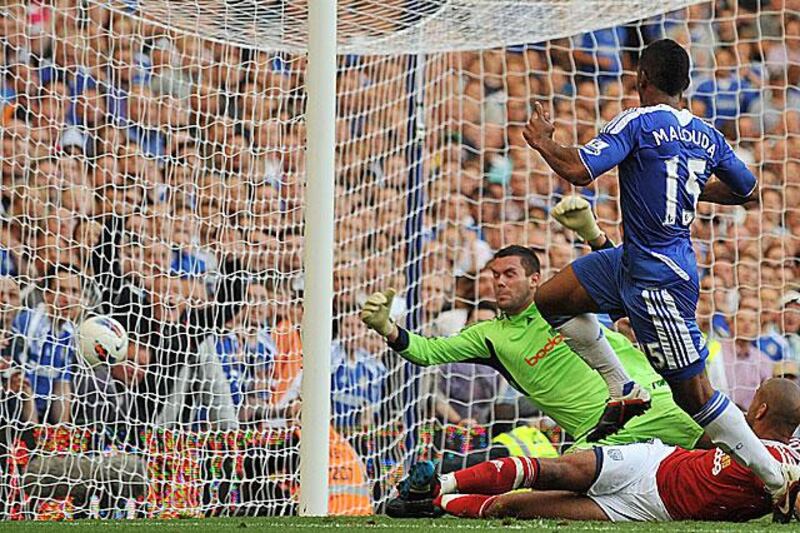 Florent Malouda tucks away the winner for Chelsea as he they have to come from behind to claim three points against West Brom.

Ben Stansall / AFP