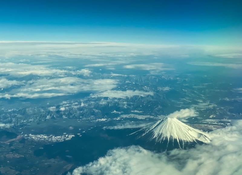 Mount Fuji, Japan's highest peak at 3,776m, viewed from the window of a flight from Tokyo to Hong Kong, above Shizuoka Prefecture. AFP