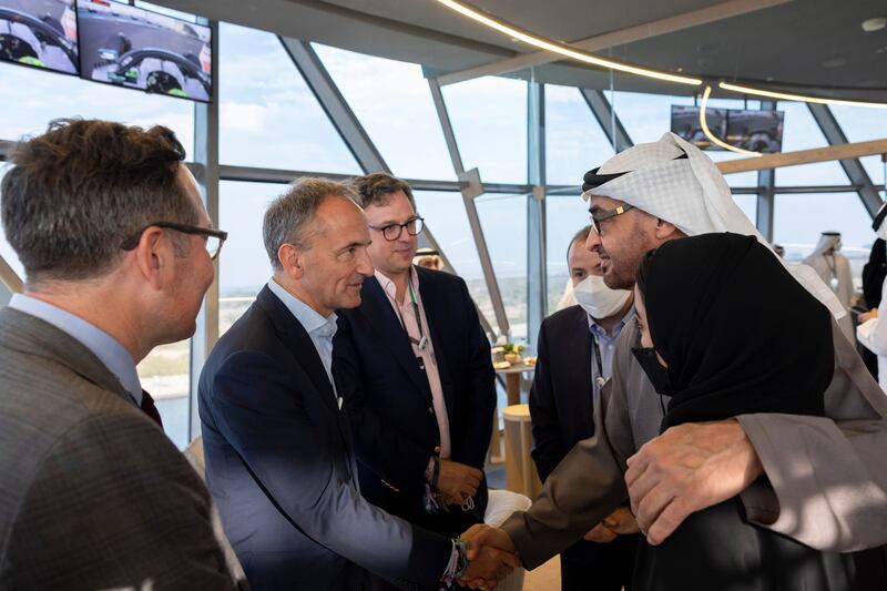 President Sheikh Mohamed greets Alberto Galassi, managing director of the Ferretti Group in Shams Tower at Yas Marina Circuit. With Sheikh Mohamed is Sheikha Hassa bint Mohamed bin Hamad bin Tahnoon Al Nahyan. Photo: Ryan Carter / UAE Presidential Court