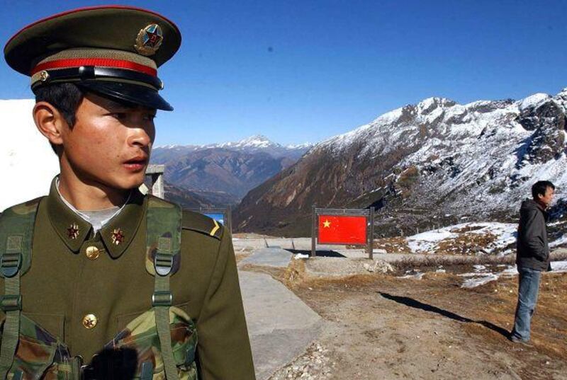 A Chinese soldier at the Nathu La Pass, a major trade route between the Indian state of Sikkim and China, which reopened in 2006 after 44 years' closure.