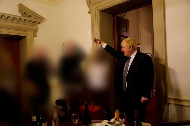 A handout photo released as the Sue Gray Report into lockdown parties in Downing Street was published, shows Mr Johnson at a gathering there in November 2020