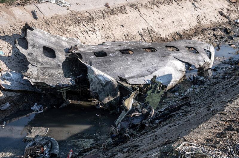 08 January 2020, Iran, Shahedshahr: A piece of airplane fuselage at the scene, where a Ukrainian airplane carrying 176 people crashed on Wednesday shortly after takeoff from Tehran airport, killing all onboard. Photo: Aref Fathi/dpa (Photo by Aref Fathi/picture alliance via Getty Images)