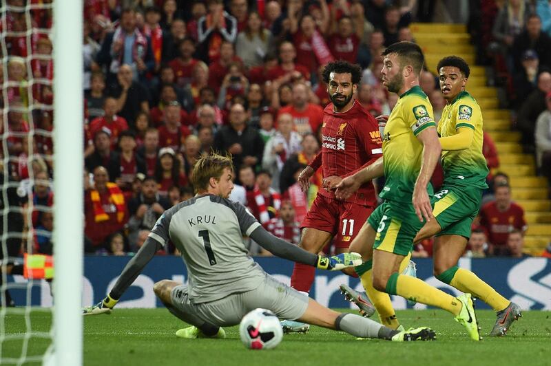 Mohamed Salah scores Liverpool's second goal against Norwich City. AFP