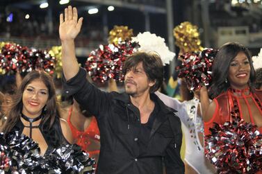 PORT OF SPAIN, TRINIDAD AND TOBAGO - SEPTEMBER 06: In this handout image provided by CPL T20, Shah Rukh Khan owner of Trinbago Knight Riders greets the crowd during the Hero Caribbean Premier League match between Trinbago Knight Riders and Jamaica Tallawahs at Queen's Park Oval on September 06, 2019 in Port of Spain, Trinidad And Tobago. (Photo by Ashley Allen/CPL T20 via Getty Images)