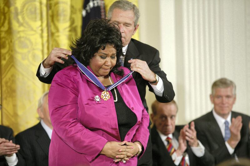 UNITED STATES - NOVEMBER 09:  Aretha L. Franklin and President George W. Bush at the Freedom Awards Ceremony at the White House in Washington D.C. on November 9, 2005.  (Photo by Douglas A. Sonders/Getty Images)
