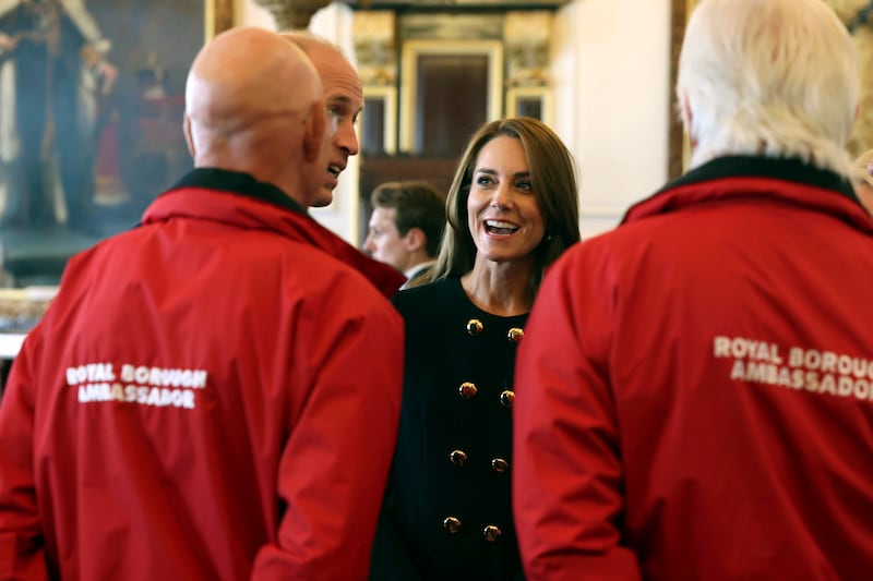 Catherine, Princess of Wales, meets the volunteers. AP