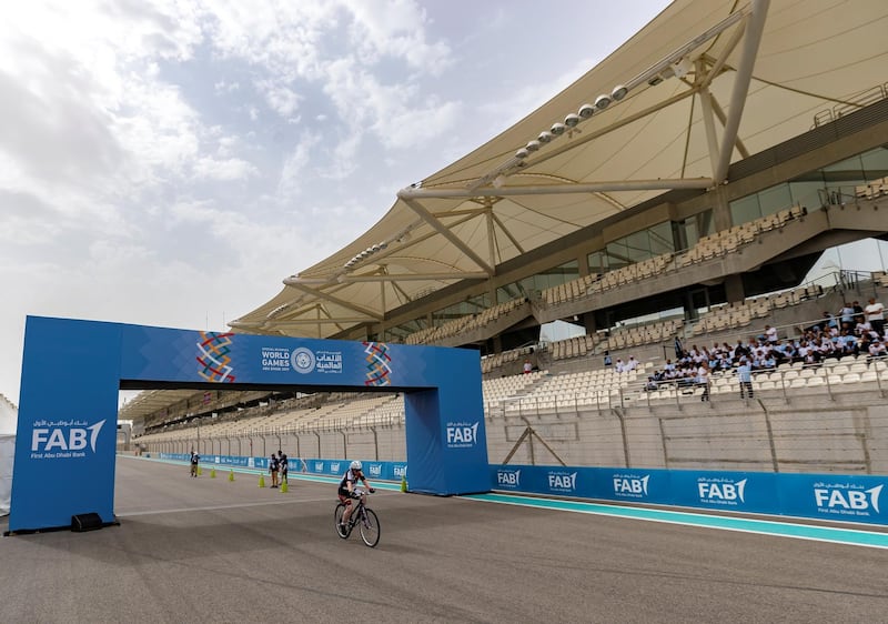 Abu Dhabi, United Arab Emirates - March 17, 2019: An athlete competes in the 5km time trial during the cycling at the Special Olympics. Sunday the 17th of March 2019 Yas Marina Circuit, Abu Dhabi. Chris Whiteoak / The National