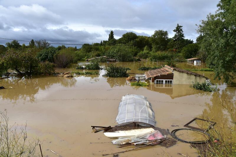 Flood waters engulf the land and buildings in Villemoustaussou, near Carcassone. AFP
