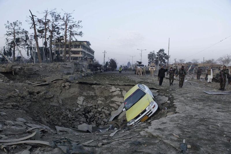 Afghan security forces and Nato troops arrive at the site of an explosion near the German consulate office in Mazar-i-Sharif, Afghanistan November 11, 2016. Anil Usyan / Reuters