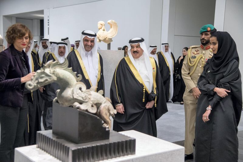 SAADIYAT ISLAND, ABU DHABI, UNITED ARAB EMIRATES - November 08, 2017: HH Sheikh Hamad bin Mohamed Al Sharqi, UAE Supreme Council Member and Ruler of Fujairah (2nd L), and HM King Hamad bin Isa Al Khalifa, King of Bahrain (3rd L), tour the LouvreAD. Seen with HH Sheikh Nasser bin Hamad bin Isa Al Khalifa (back R).
( Omar Al Askar for Crown Prince Court - Abu Dhabi )
---