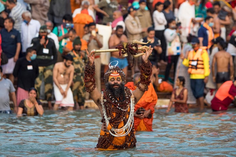 A Sadhu bathes in the Ganges river during the ongoing religious Kumbh Mela festival, in Haridwar. AFP
