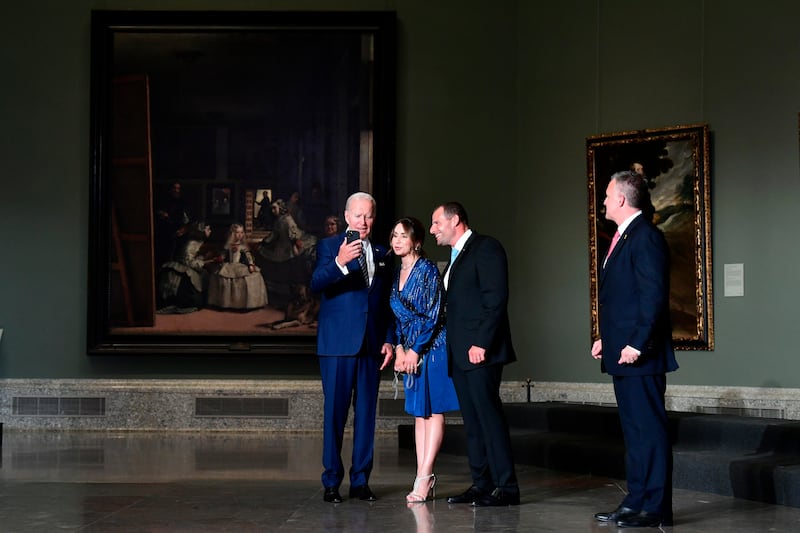 Mr Biden takes a selfie with Maltese Prime Minister Robert Abela and his wife Lydia Abela as they visit the Prado Museum. AP