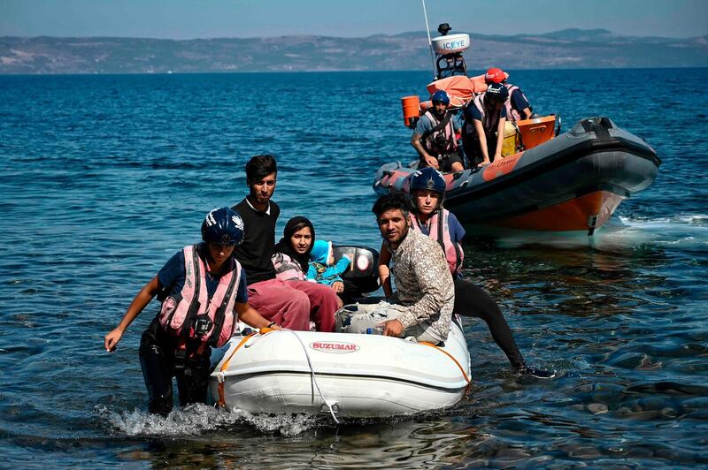 Migrants arrive on the Greek island of Lesbos after crossing the Aegean Sea from Turkey. AFP