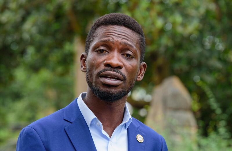 epa08963647 (FILE) - Ugandan presidential candidate Robert Kyagulanyi Ssentamu, otherwise known as Bobi Wine, speaks during a press conference the day after elections at his home in Kampala, Uganda, 15 January 2021 (reissued 25 January 2021). Media reports on 25 January 2021 state Ugandan security forces that have cordoned off Wine's home have been ordered by a court to call off the siege, following an earlier court decision ordering Wine to a house arrest. Ugandan soldiers have blocked the opposition leader from leaving his home ever since he cast his vote in 14 January 2021 elections.  EPA/STR