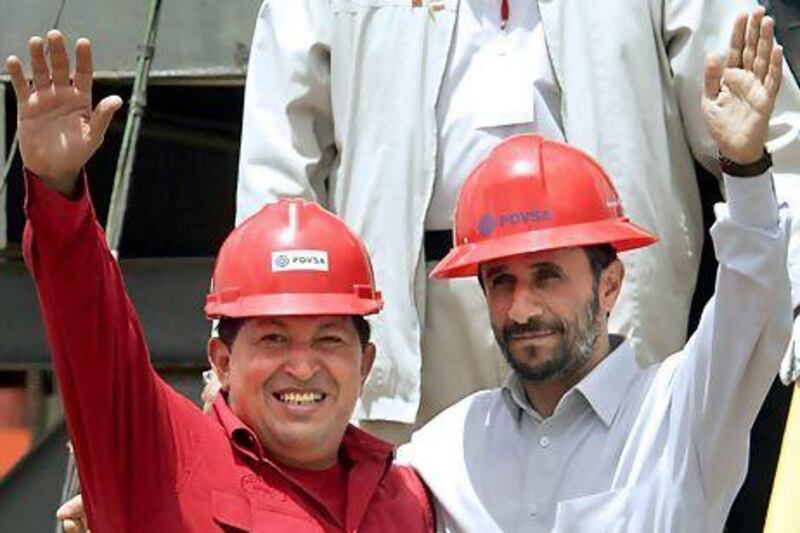 Hugo Chávez's economic impact was similar to that of fellow oil-fuelled authoritarian, Mahmoud Ahmadinejad. Fernando Llano / AP Photo