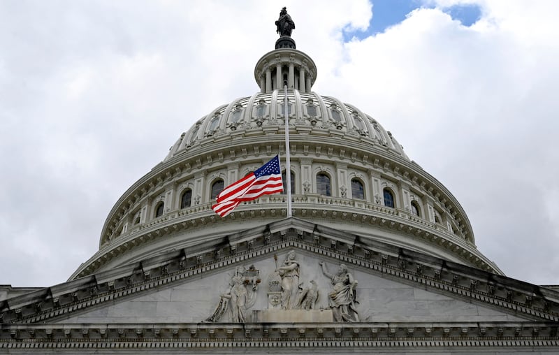 The US flag flies at half-staff at the US Capitol in Washington, DC, on September 8, 2022 following the death of Britain's Queen Elizabeth II. AFP