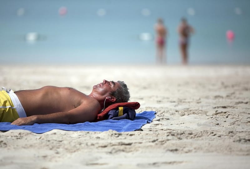 Doctors recommend brief exposure to overcome vitamin D deficiency, but advise residents to wear high-factor sun cream and to be aware of skin cancer symptoms. Silvia Razgova /The National