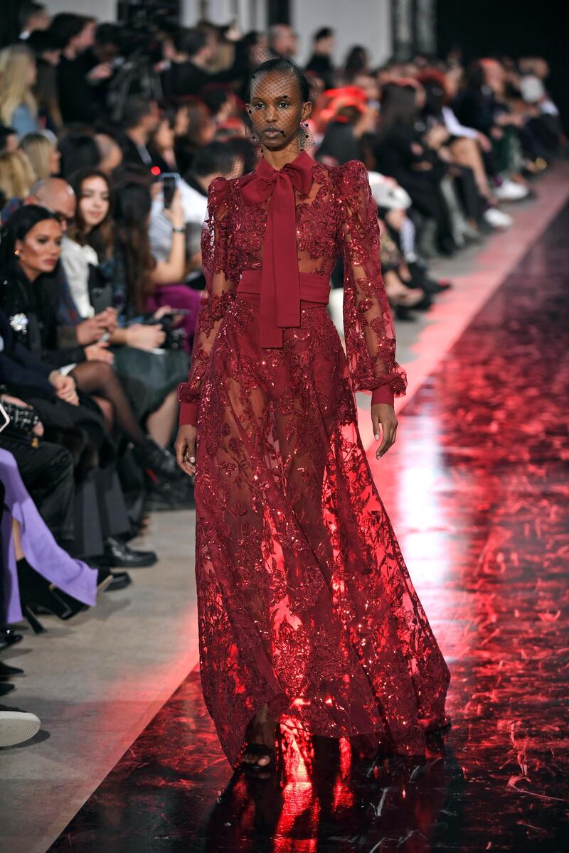 epa08259612 A model presents a creation by Lebanese designer Elie Saab from the Fall-Winter 2020/21 women's collection for Elie Saab fashion house during the Paris Fashion Week, in Paris, France, 29 February 2020. The Fall-Winter 2020/21 women's collection runs from 24 February to 03 March 2020.  EPA/JULIEN DE ROSA