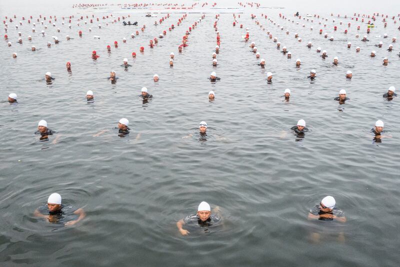 Indonesian soldiers, police and residents perform during celebrations for the 77th anniversary of the Indonesian Army at Marina beach in Jakarta, Indonesia. Reuters