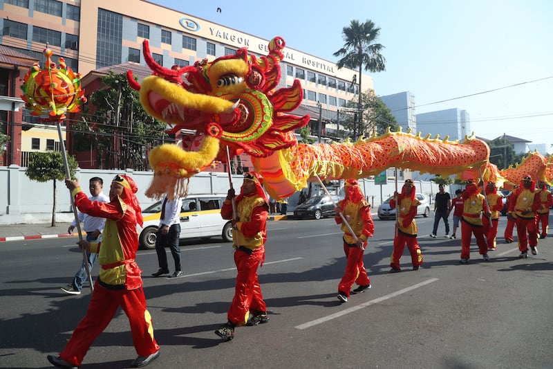 Chinese artists perform a dragon dance in Yangon, Myanmar. AP Photo