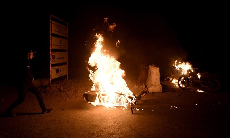 Supporters of religous group Tehrik Labaik Ya RasoolAllah (TLP) burn a bike during a protest over the Khadim Hussain Rizvi arrest in Karachi, Pakistan.  Tehreek-e-Labbaik Pakistan (TLP) chief Khadim Hussain Rizvi has been taken into protective custody by the police.  EPA