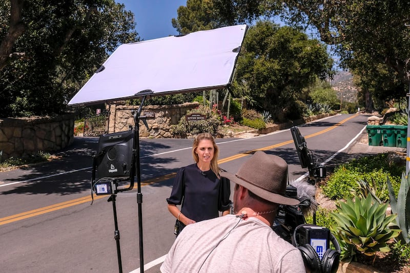 Members of media near a community gate at the home of Prince Harry, Duke of Sussex and Meghan Markle, Duchess of Sussex in Montecito, California, US, after the announcement of the death of Britain's Prince Philip. AP Photo