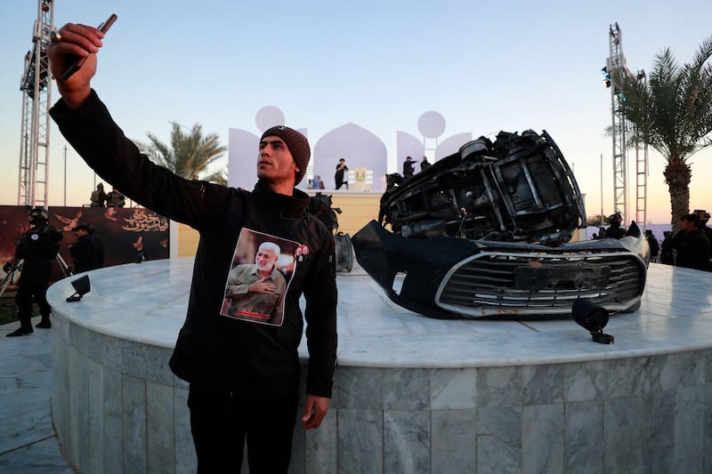 The wreckage of the car that carried Qassem Suleimani and Abu Mahdi Al Muhandis when they were killed in a drone strike in 2020. AFP