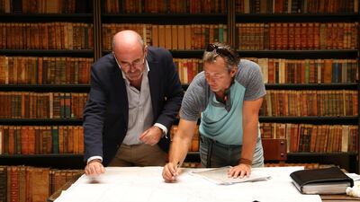 Manuel Rodriguez and Miklos pore over old documents in Jerez, Spain. Courtesy Discovery Communications