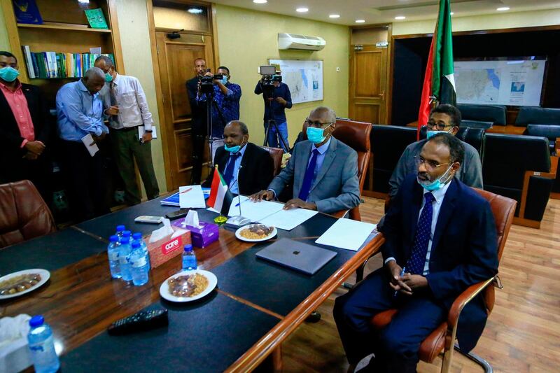 Sudan's Minister of Irrigation and Water Resources Yasir Mohamed (C) takes part in a video meeting over the Grand Ethiopian Renaissance Dam on June 9, 2020. AFP
