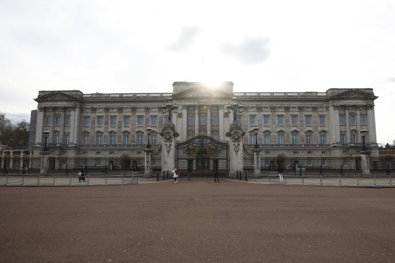 The outside of Buckingham Palace is unusually empty on March 20, 2020 after a shutdown of the British capital in the wake of the coronavirus pandemic. Bloomberg