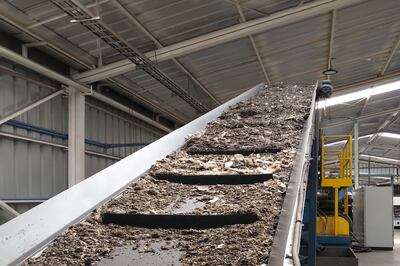 Waste is fed into the machine to be turned into plywood replacement and other products. Photo: Terrax