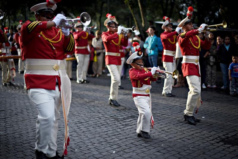 High-school students perform in a parade on September 14, 2016, celebrating Guatemala’s 195th independence day in Guatemala City. Johan Ordonez / Agence France-Presse