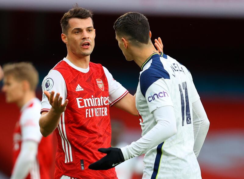 Granit Xhaka - 6: More assured than he often has been in this fixture in the past. Had the sort of hit he craves with a crunching tackle on Doherty. Yellow carded, as standard. EPA